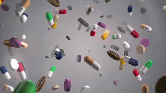 各种五颜六色的药丸在白色下雨视频的预览图