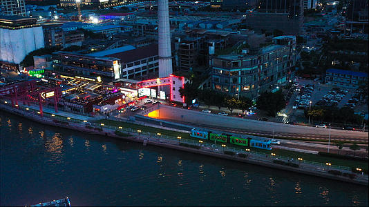 4k高清航拍广州珠江边上傍晚的琶醍城市建筑视频的预览图