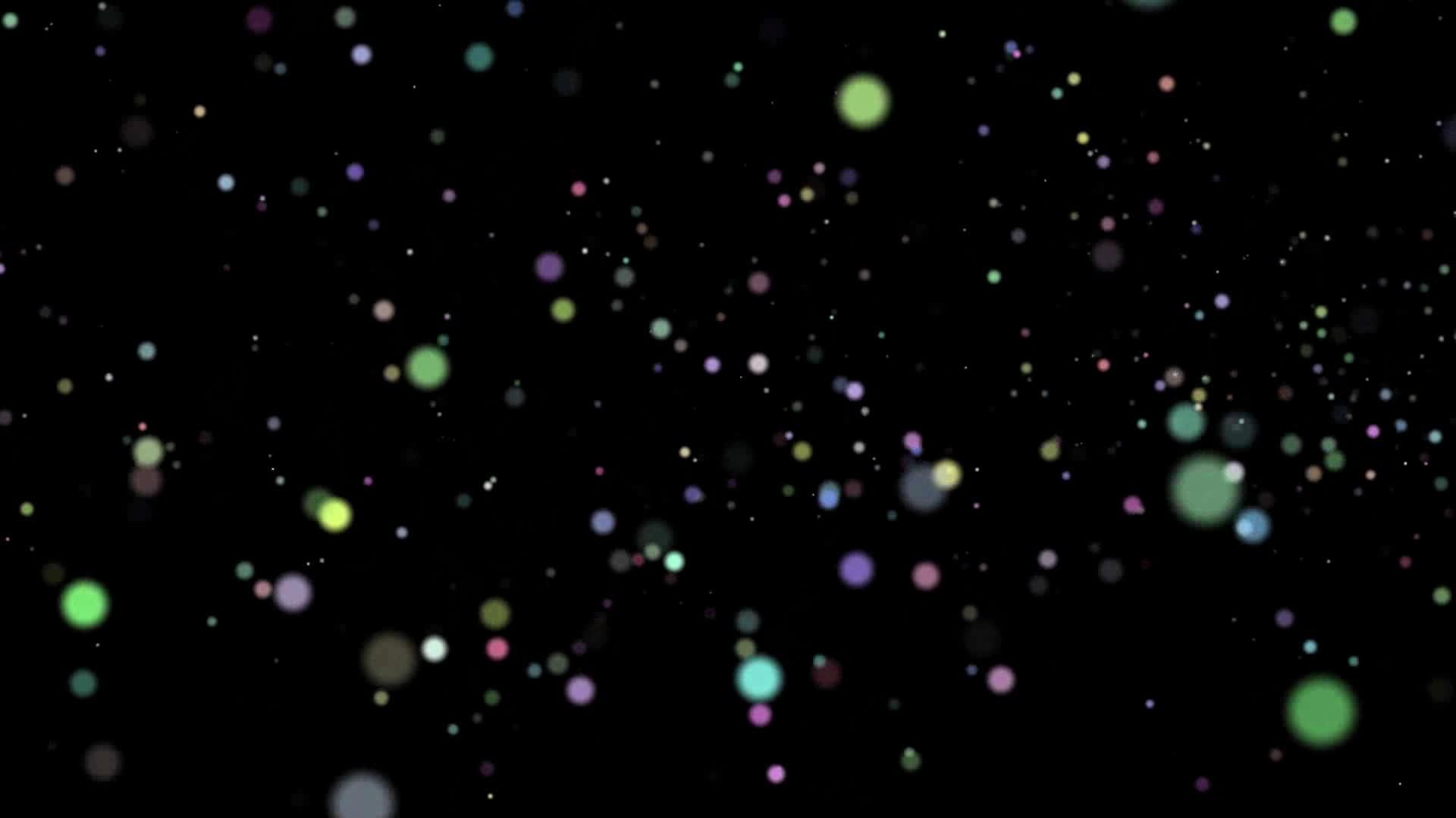 彩色圆球在黑色背景上快速无序移动视频的预览图