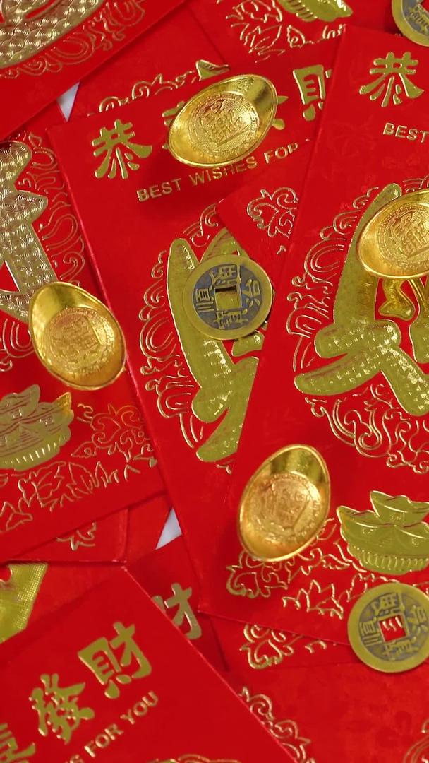 红火过年春节红包铜钱元宝静物视频视频的预览图