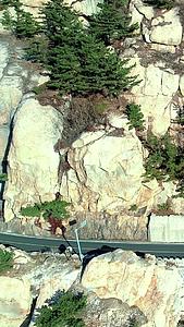 山海之间的公路青岛崂山网红路航拍视频的预览图