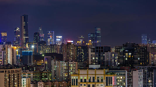 8K高清深圳南山区汉东集团腾讯总部大厦城市白转夜延时视频的预览图