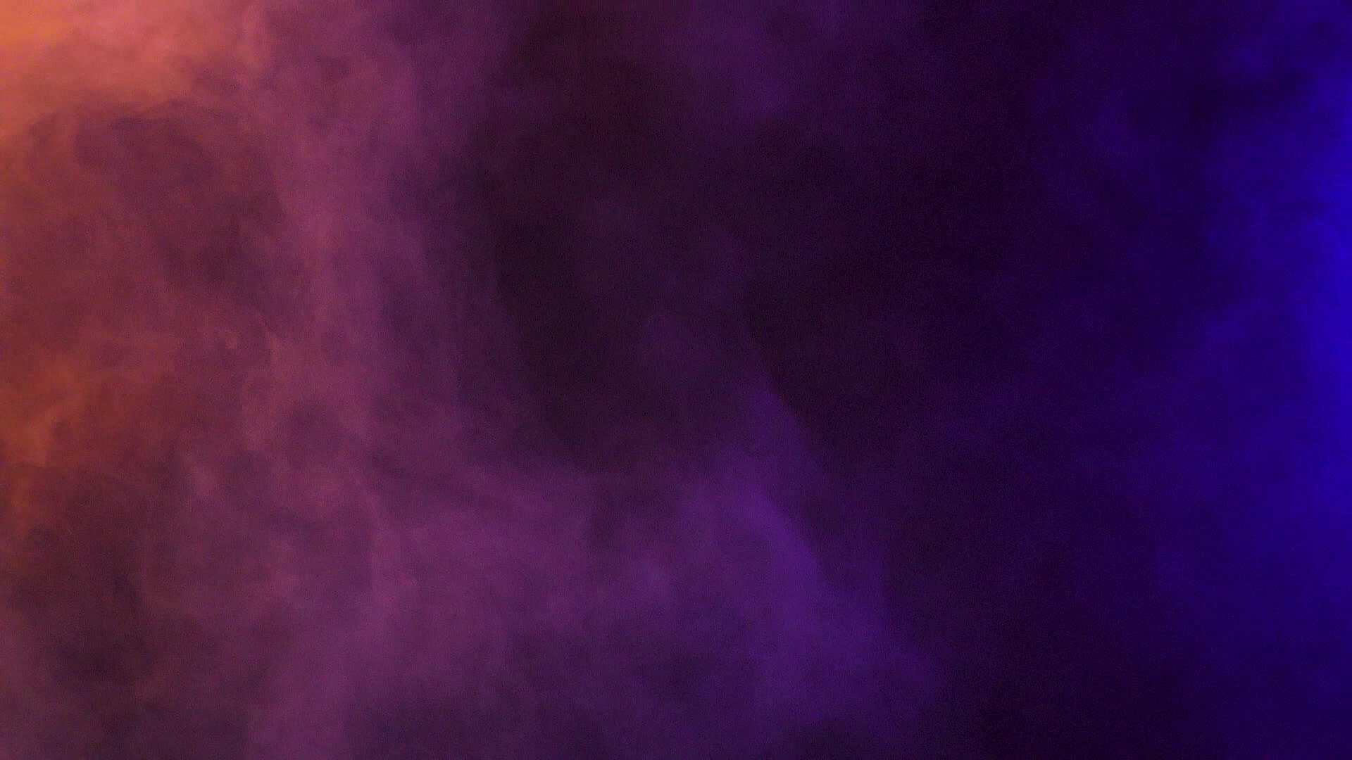 抽象的多色烟雾在黑色背景视频的预览图