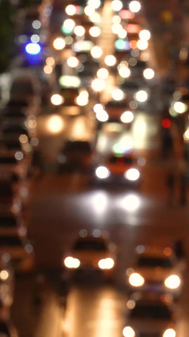 航拍城市梦幻虚焦道路交通灯夜景车流素材视频的预览图