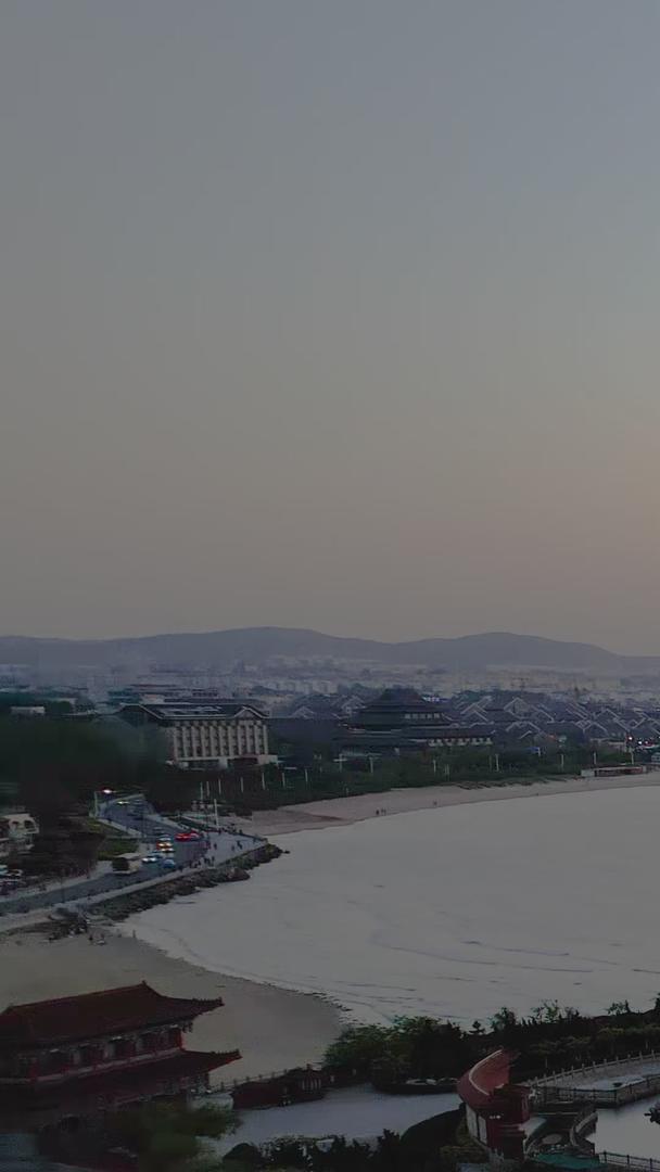航拍5A烟台蓬莱八仙渡景区日落夜景视频视频的预览图