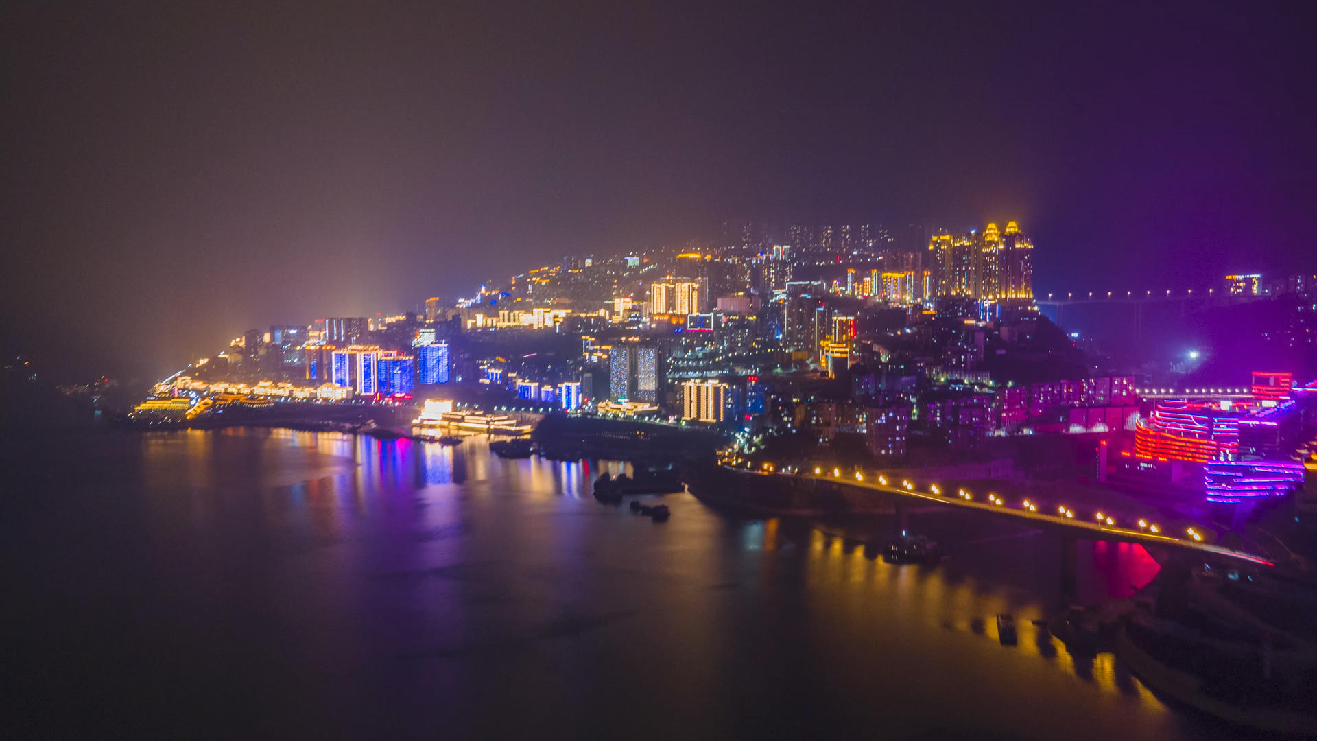 4K航拍延时江边城市夜景推进视频的预览图
