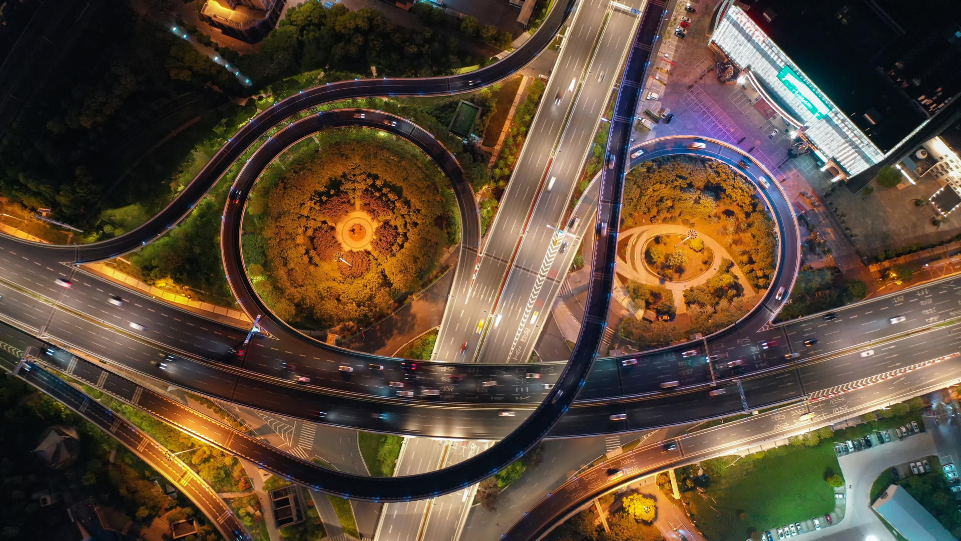 航拍城市夜景风光4k素材彩色立交桥视频的预览图