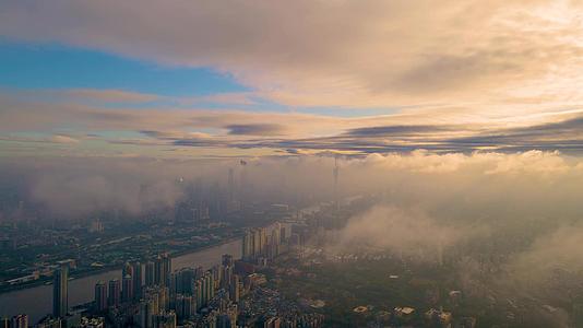 航拍云海下的广州城市天际线视频的预览图