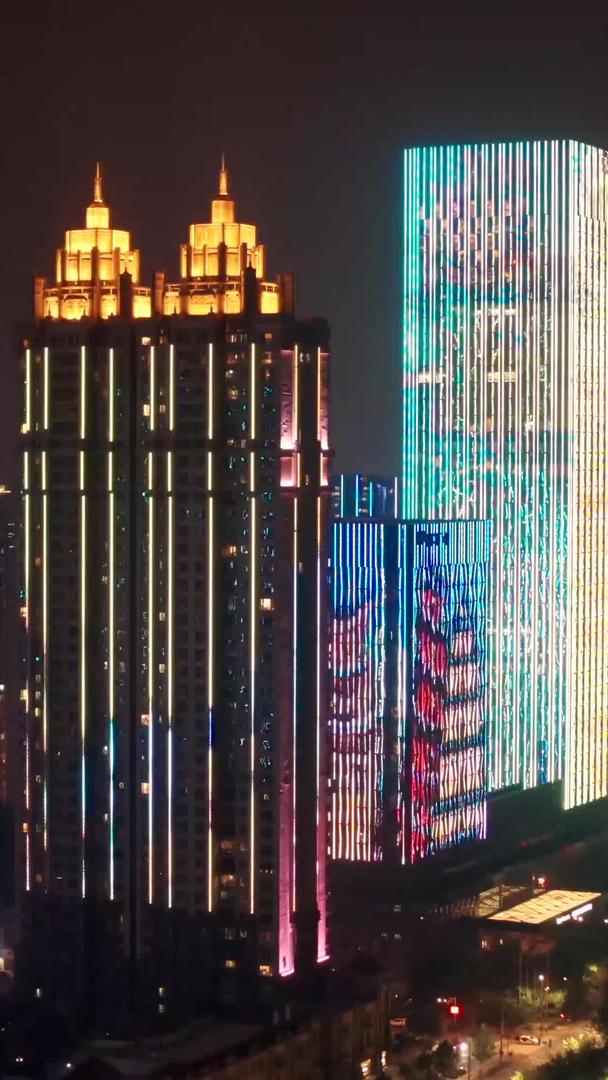 航拍江边建筑及城市灯光秀视频的预览图
