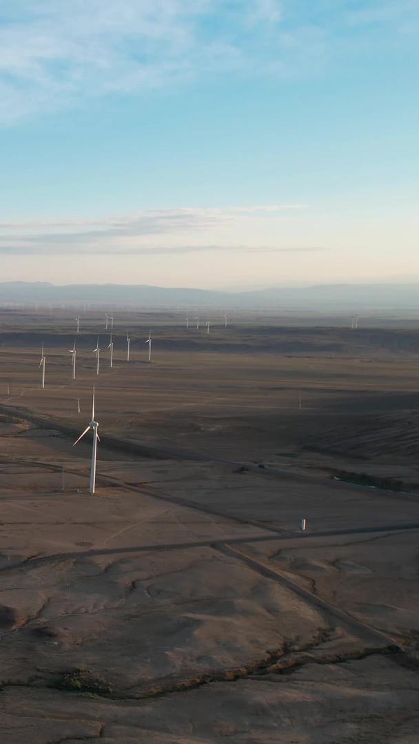 在新疆布尔津戈壁拍摄电力风车视频视频的预览图