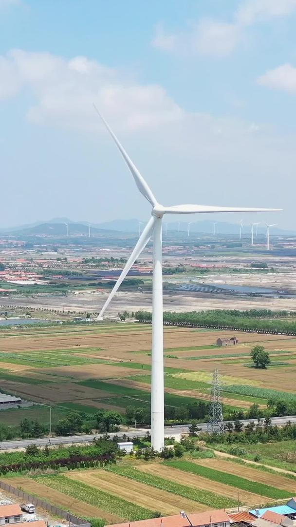夏季乡村风光及风力发电机航拍视频视频的预览图