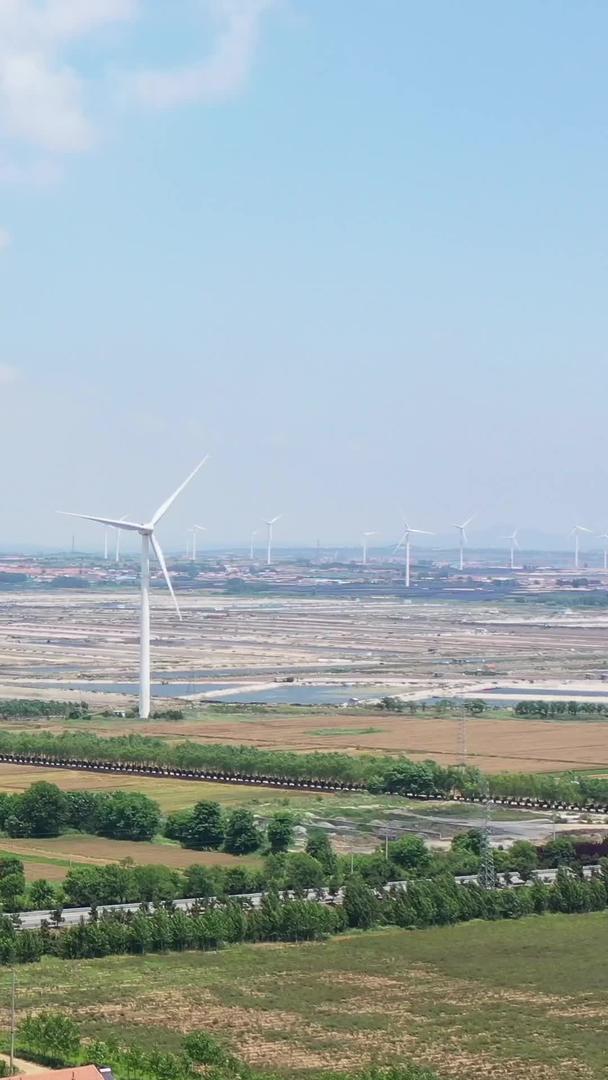 夏季乡村风光及风力发电机航拍视频视频的预览图