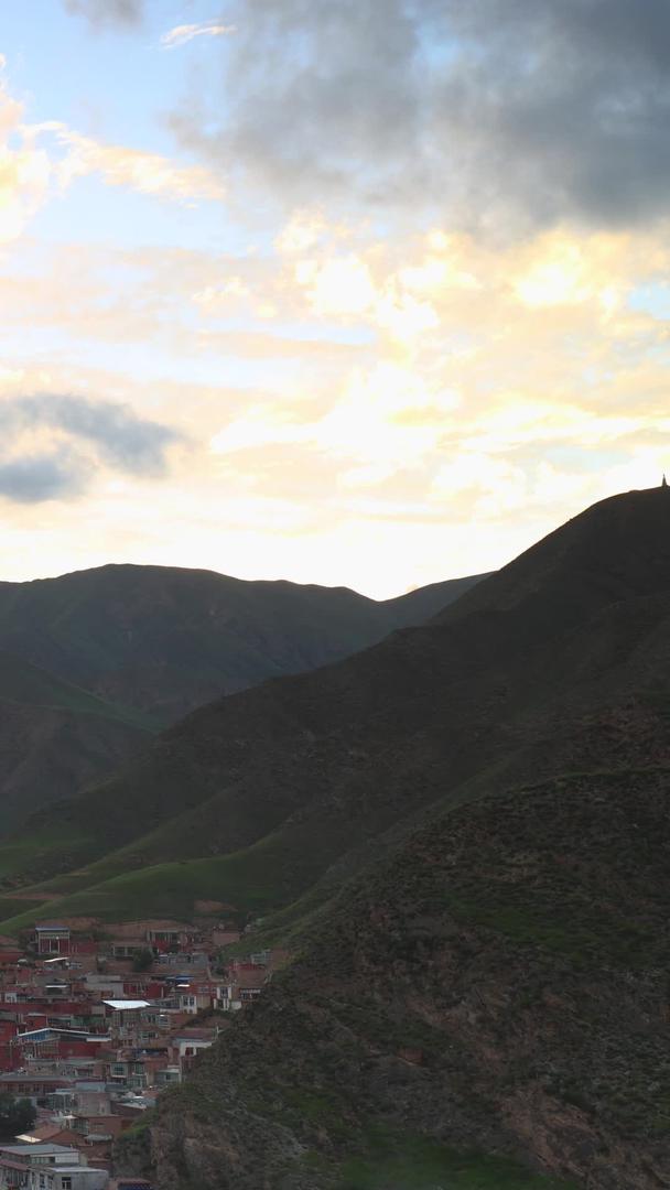 甘南藏族自治州群山环绕乡村日落延迟视频视频的预览图