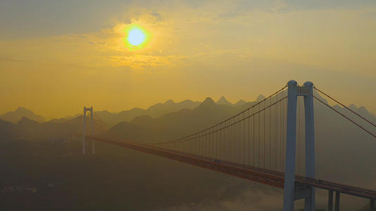 贵州航拍日出湖陵河大桥视频的预览图