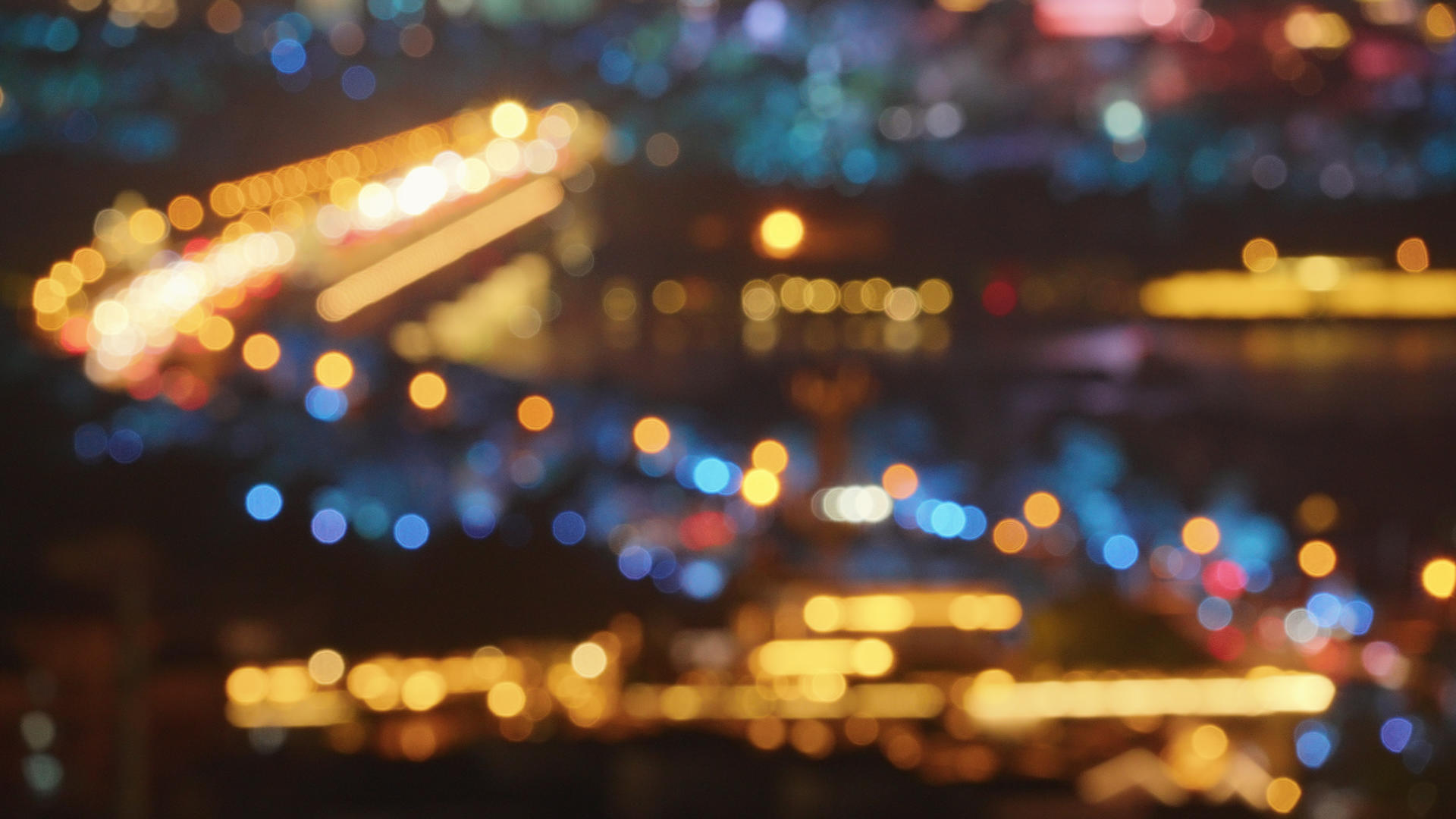 航拍城市虚焦光斑道路街景交通车流夜景灯光4k素材视频的预览图