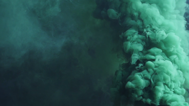 无缝循环绿色烟雾动态背景视频的预览图