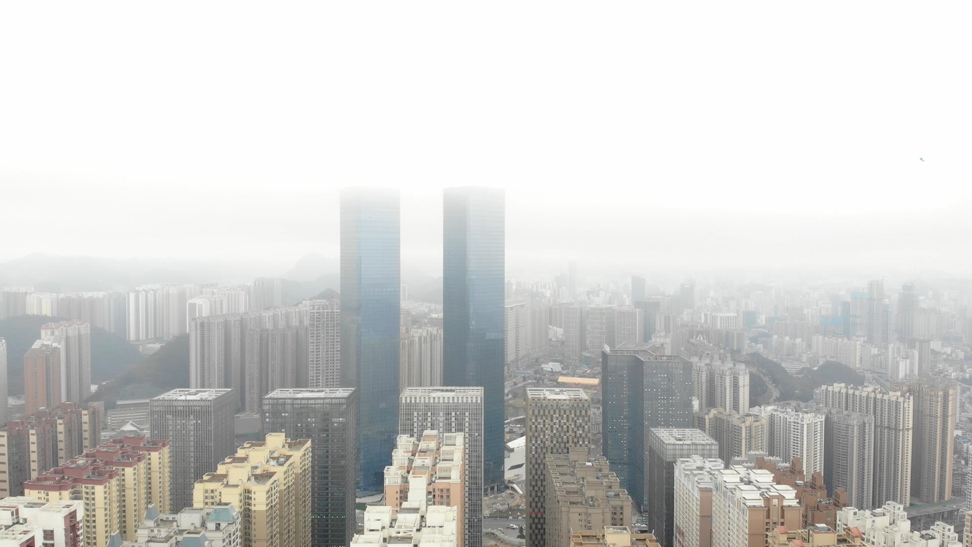 4K超清航拍城市远景贵阳双子大厦视频的预览图