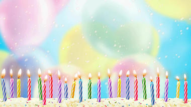 卡通梦幻甜蜜生日蛋糕蜡烛光斑背景视频视频的预览图