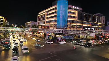4K升格杭州夜晚拥堵的十字路口车流视频的预览图