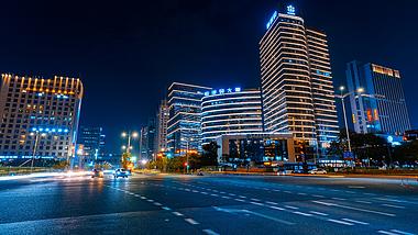 8K杭州夜晚繁华十字路口密集飞速车流延时视频的预览图