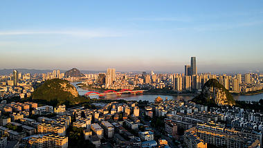 4K航拍夕阳下柳州城市建设视频的预览图
