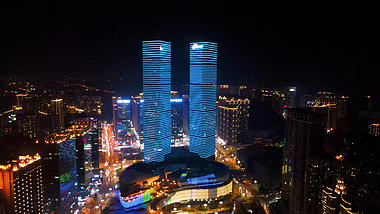 4K航拍城市贵阳双子塔夜景地标建筑视频的预览图