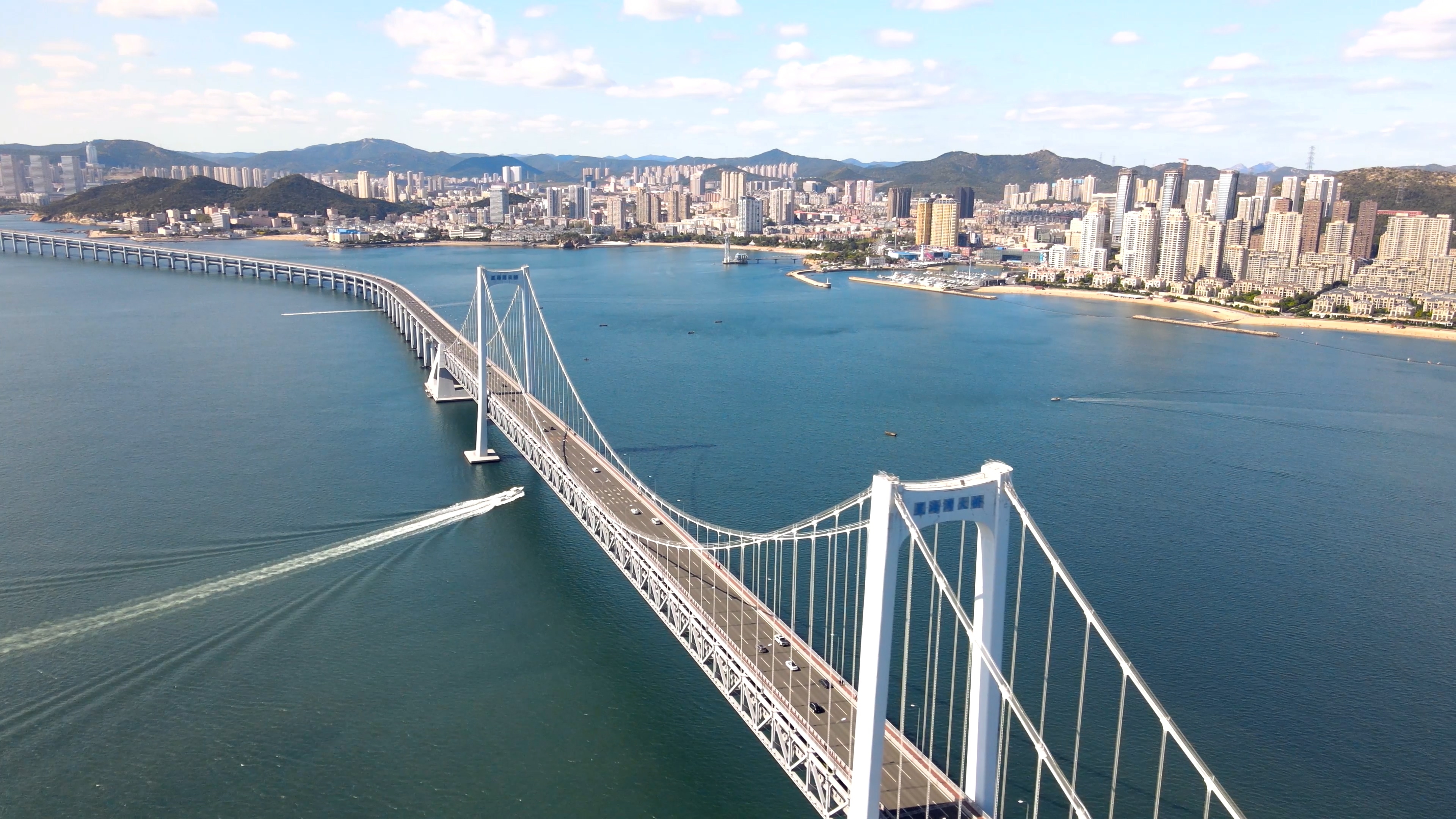 4K航拍星海湾大桥全景大连城市地标建筑视频的预览图