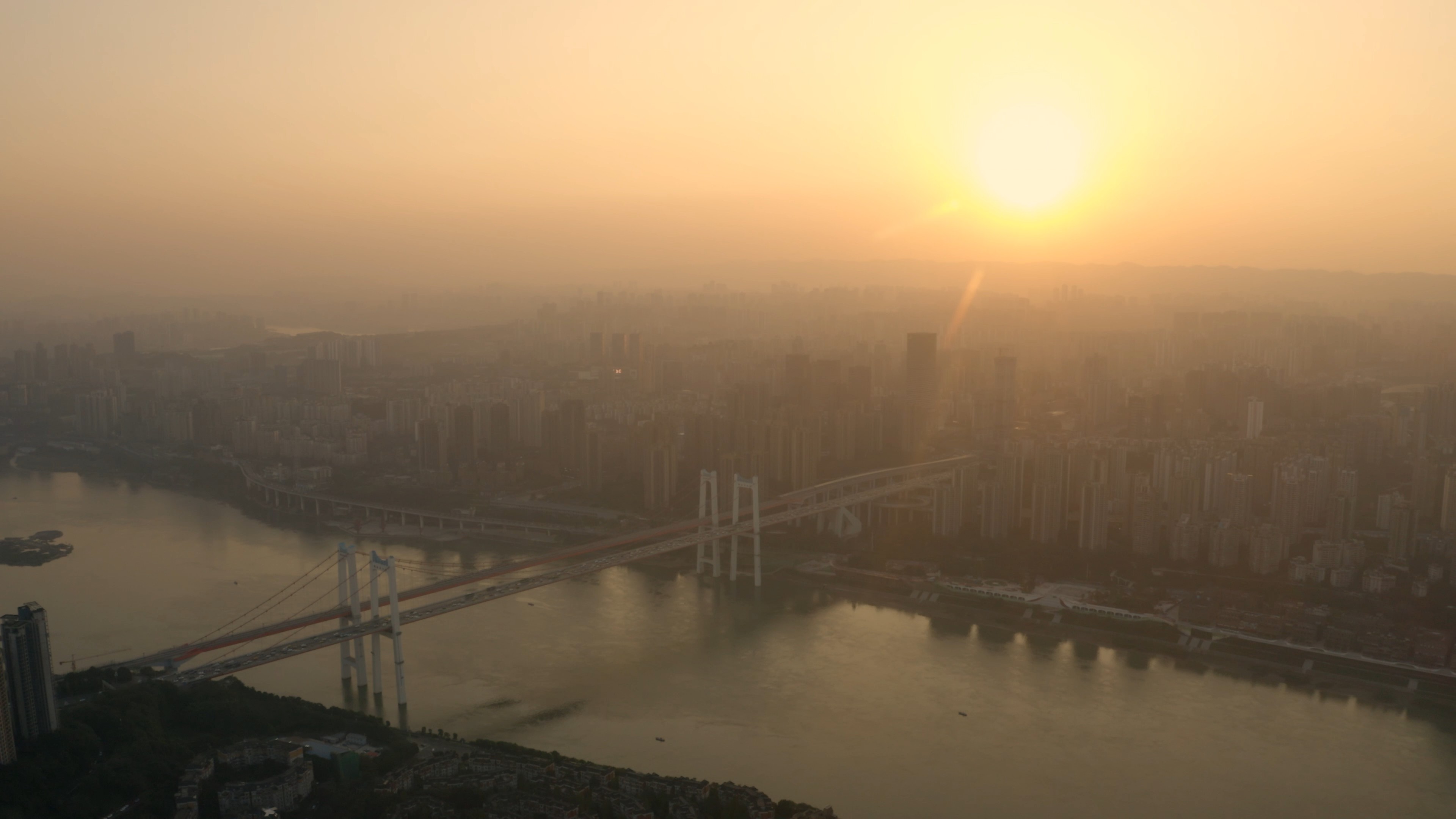 4k航拍夕阳下的重庆滨江城市风光视频的预览图