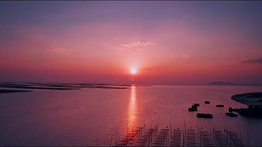 1080唯美航拍海边粉色夕阳高帧率空镜视频视频的预览图