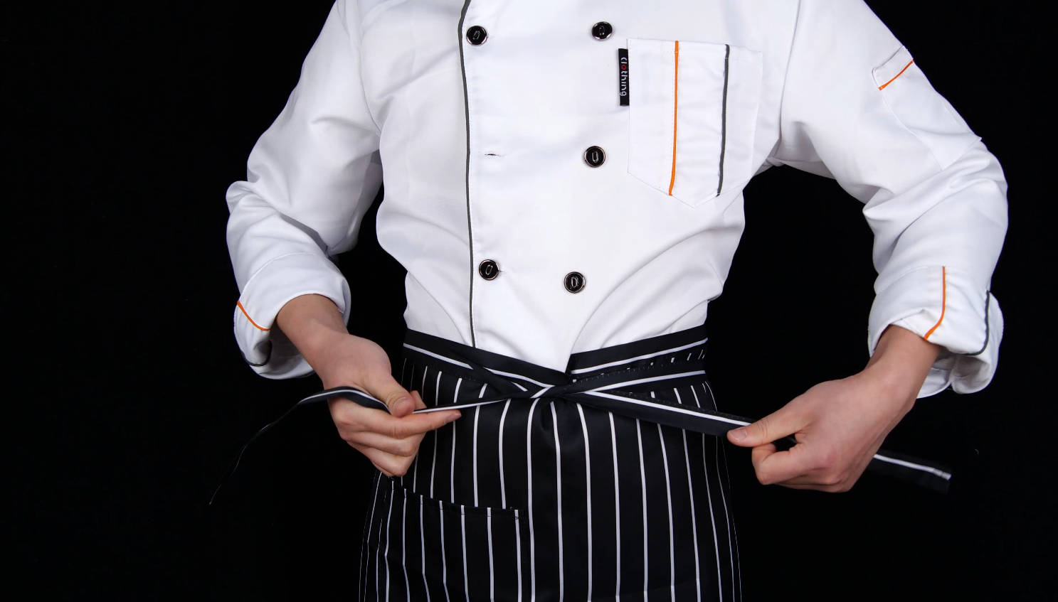 4K厨师整理衣服穿厨师服酒店后厨宣传视频的预览图