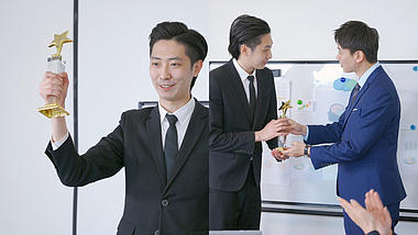 4K青年男性职员白领获奖杯炫耀视频的预览图