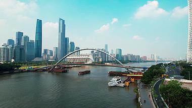 4k蓝天白云广州珠江上的人行桥建筑工地建设中视频的预览图