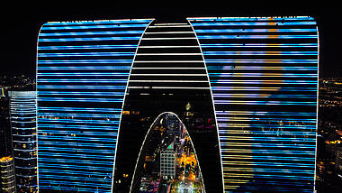 4K航拍夜晚苏州地标东方之门裤子楼夜景视频的预览图