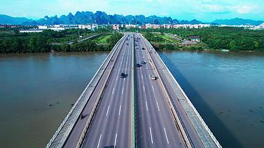4k桂林龙门大桥城市桥梁车流行驶航拍视频的预览图
