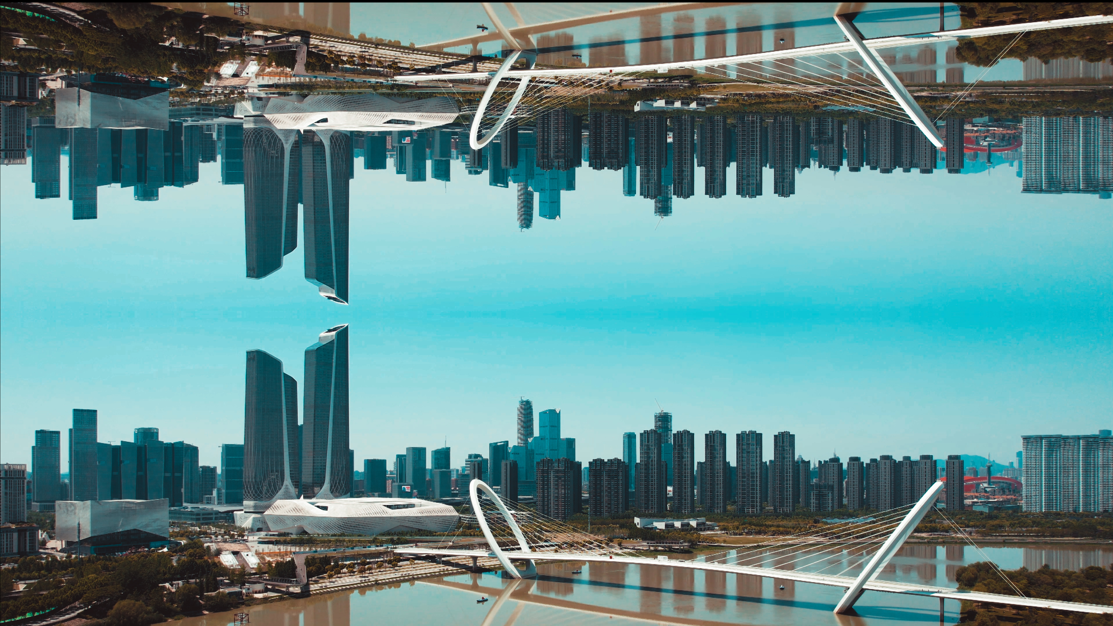 4k航拍南京河西CBD双子楼城市倒影视频的预览图