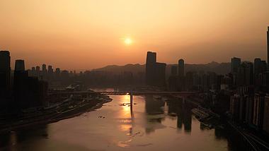 4k航拍重庆清晨日出嘉陵江两岸城市剪影城市日出视频的预览图