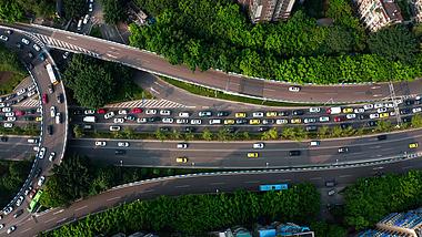4k航拍环形公路早高峰堵车车辆缓慢行驶城市交通视频的预览图