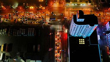 4K航拍俯视繁华的城市交通车流夜景视频的预览图