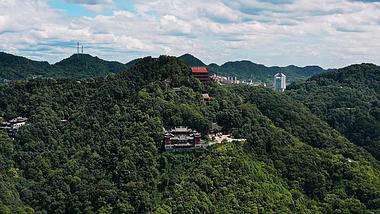 4k航拍坐落山间被山林包裹的古庙寺庙视频的预览图