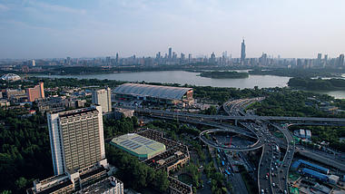 4K航拍南京市地标新庄立交城市车水马龙车流视频的预览图
