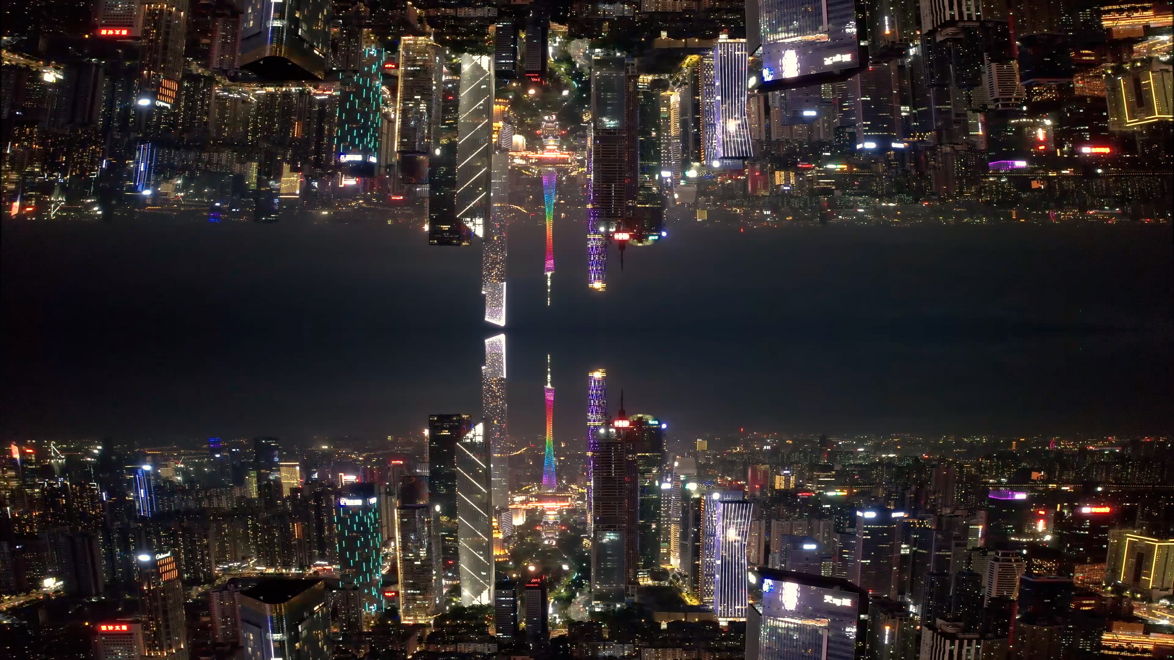 4k航拍广州塔珠江新城中轴线翻转城市夜景视频的预览图