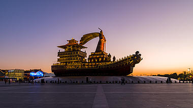 4K日转夜延时西安昆明池汉武大帝楼船雕像视频的预览图