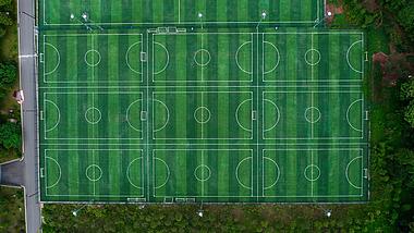 4k航拍俯瞰空旷的足球场足球体育运动视频的预览图