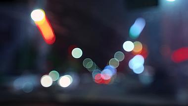 4k夜间行驶的车辆灯光光斑虚化意境空镜视频的预览图