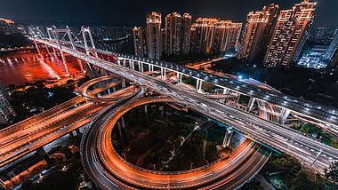 8k震撼重庆鹅公岩大桥密集车流夜景延时视频的预览图