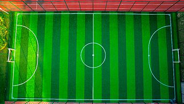 4K航拍学校操场崭新的足球场视频的预览图