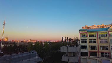 4k延时拍摄城市日出夜转日视频素材视频的预览图