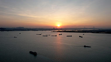 4k航拍城市湖面渔船日出日落风光视频的预览图