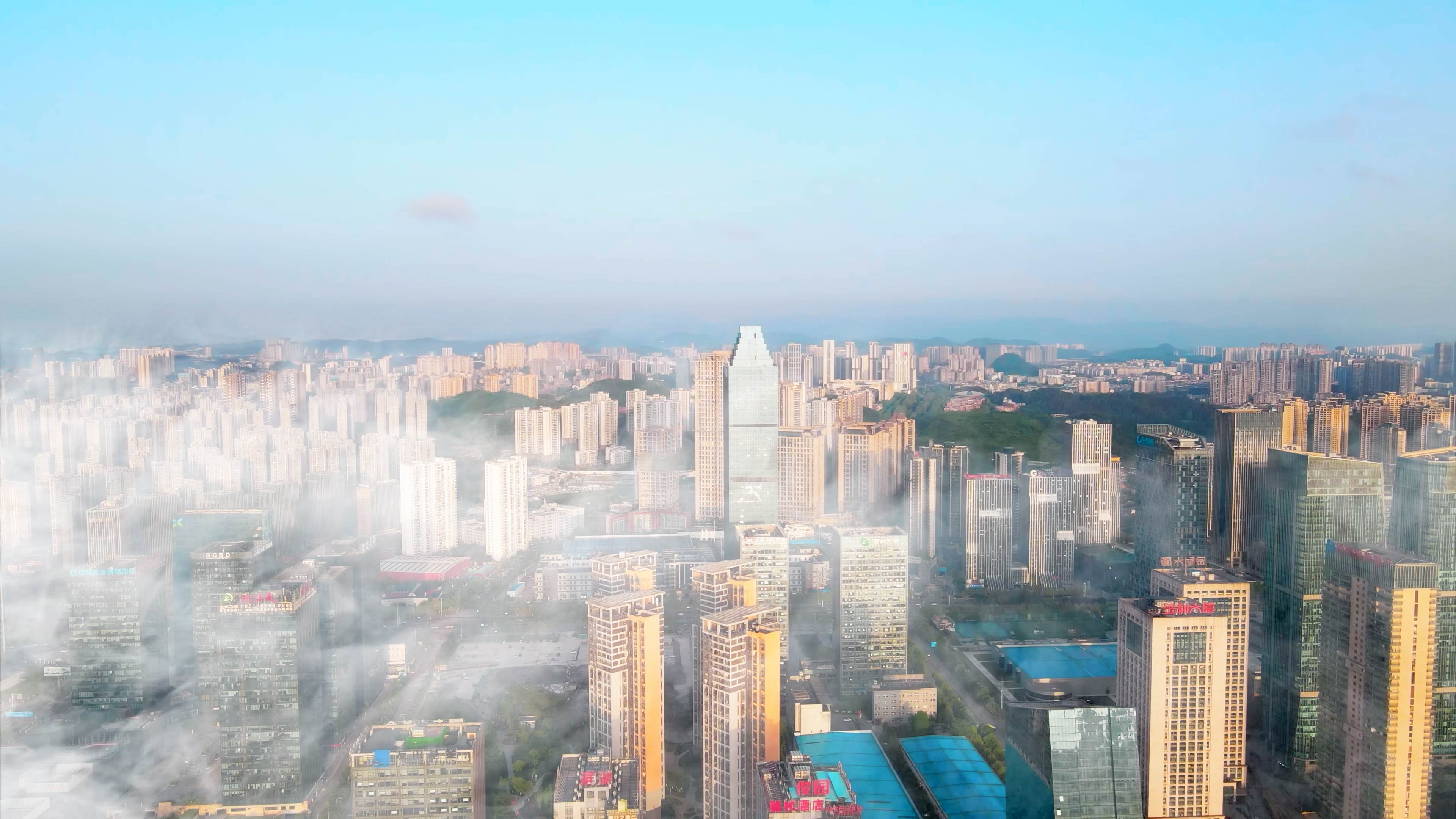 4K航拍云雾中商务大楼建筑大厦视频的预览图