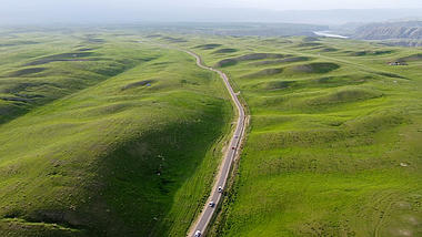 4k新疆伊犁草原公路航拍祖国风光视频的预览图